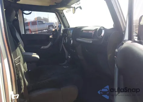 2012 Jeep Wrangler Unlimited Rubicon из США, поврежденный, VIN 1C4HJWFG7CL259255